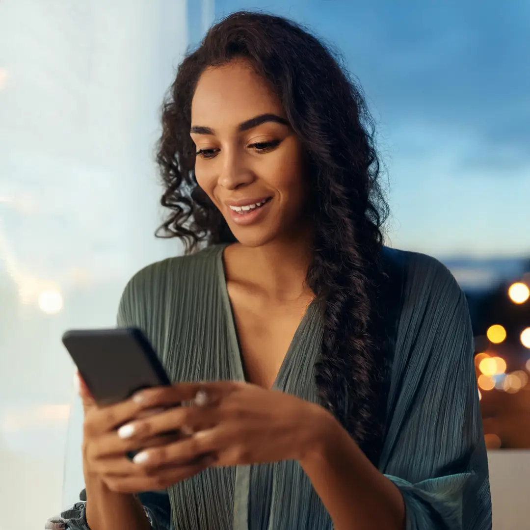 woman looking at phone