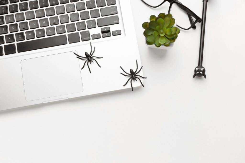 top-view-laptop-with-spooky-spiders-1024x683 image resembling AI crawler issues